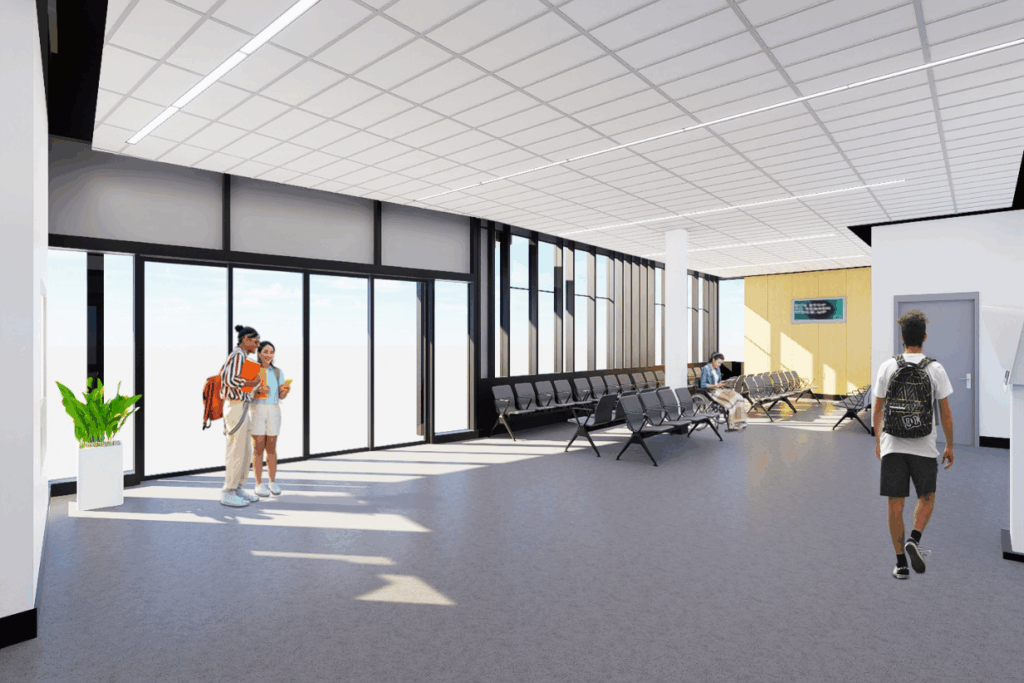 Rendering of a bright, modern transit lobby with large floor-to-ceiling windows, rows of connected gray seats along the perimeter, and a few people standing or walking through the space. Sunlight casts long shadows across the floor, and a small plant sits near the entrance.